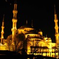 Sultan Ahmed Mosque lit up at night.
