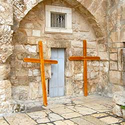 Two crosses outside of the Holy Sepulchre.