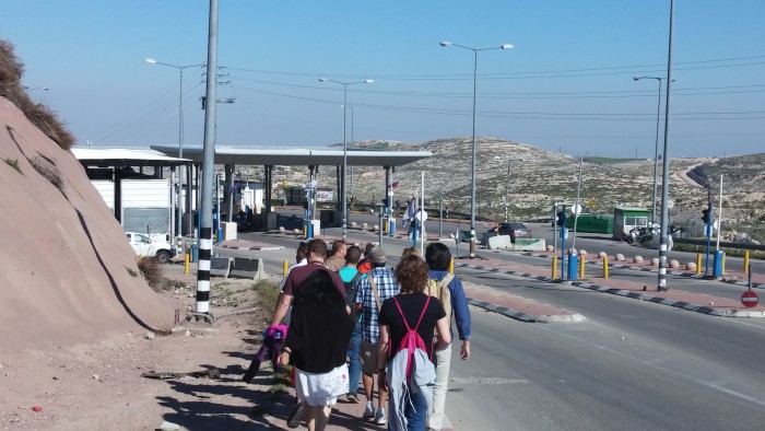 Tour of the Separation Wall and observing a checkpoint in East Jerusalem